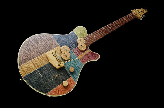 Jersey Girl Homemade Guitars - Tapa Festeeva, a handcrafted guitar with a colorful wooden design, made in Japan.