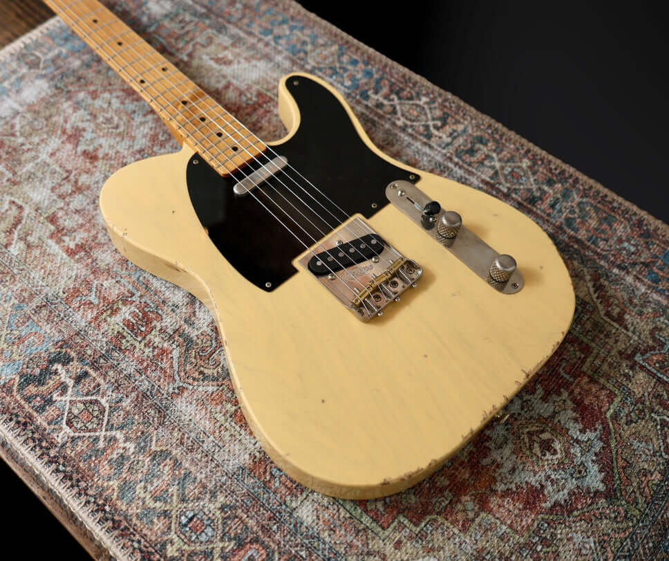 K-Line Truxton - Butterscotch Blonde. NEW, (Authorized Dealer) displayed on a vintage patterned rug.